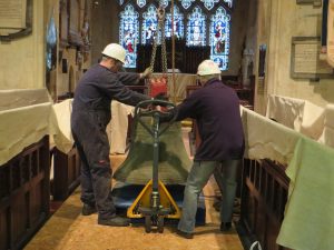 Reg and James manoeuvre a bell